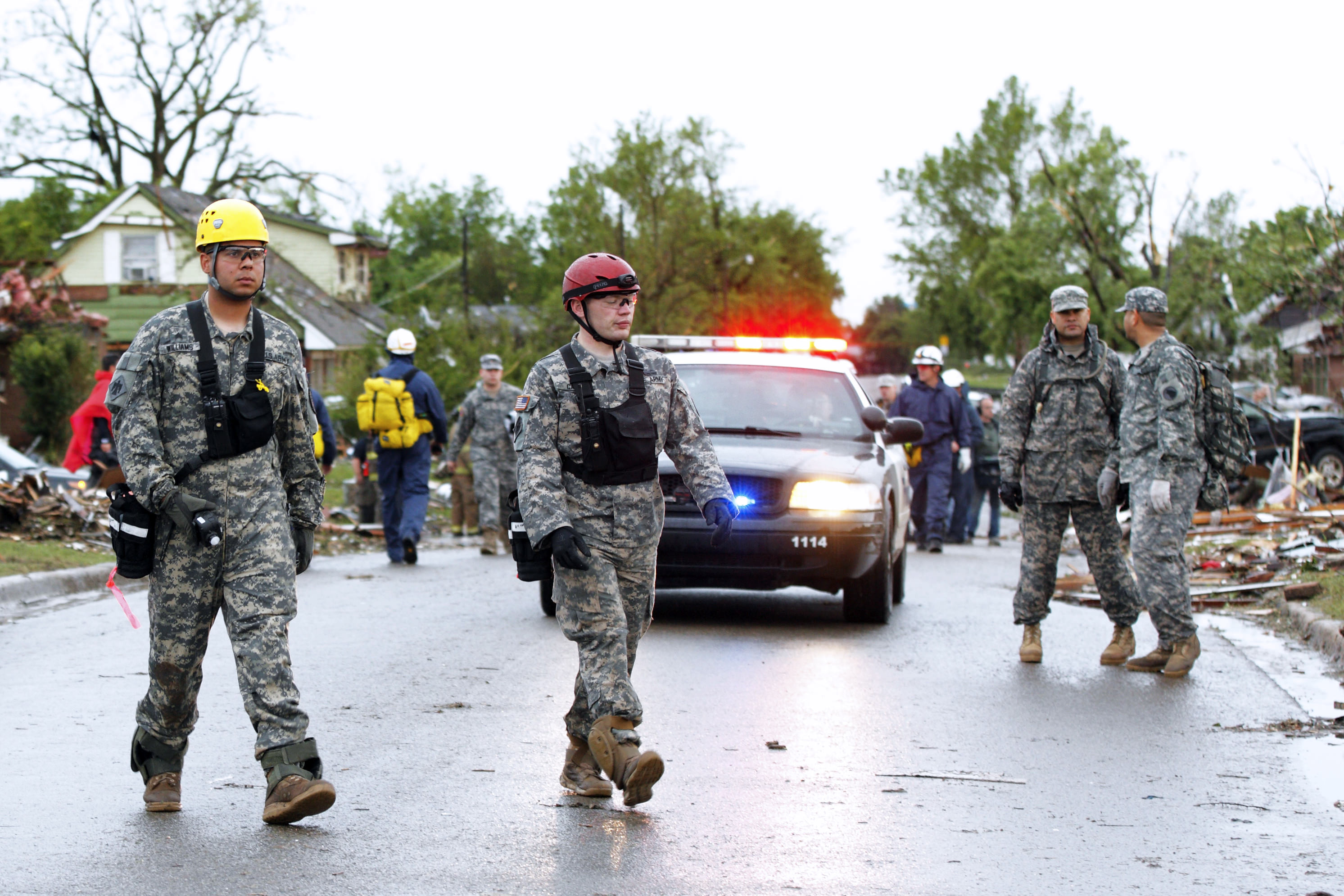 national guard in damaged street