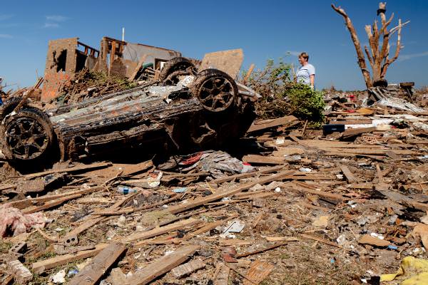 tornado debris damaged car